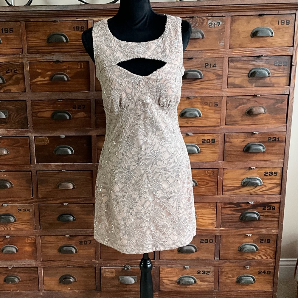 Sequenced sleeveless dress with keyhole cutouts across the chest and back